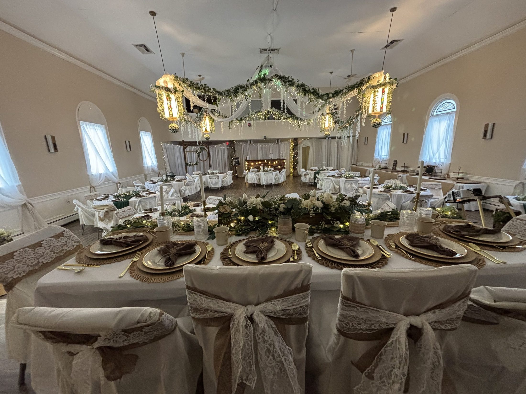 The hall set for a wedding reception